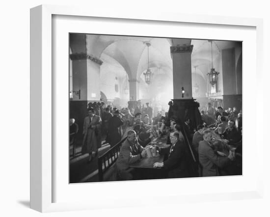Interior of Munich Beer Hall, People Sitting at Long Tables, Toasting-Ralph Crane-Framed Photographic Print