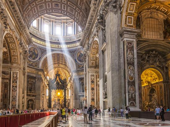 Interior of St. Peters Basilica with Light Shafts Coming Through the