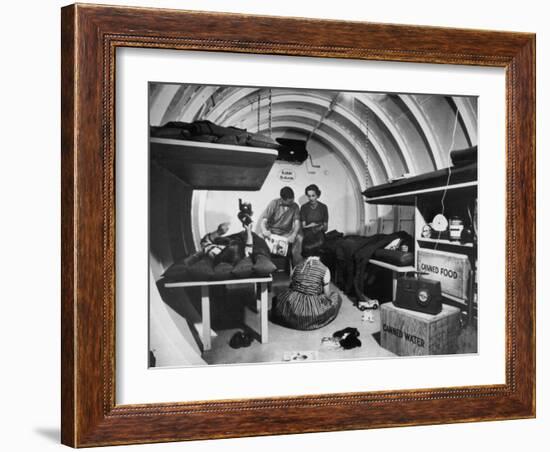 Interior View of Steel Underground Radiation Fallout Shelter Where Couple Relaxes with 3 Children-Walter Sanders-Framed Photographic Print