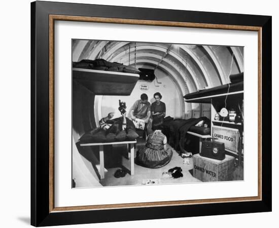 Interior View of Steel Underground Radiation Fallout Shelter Where Couple Relaxes with 3 Children-Walter Sanders-Framed Photographic Print