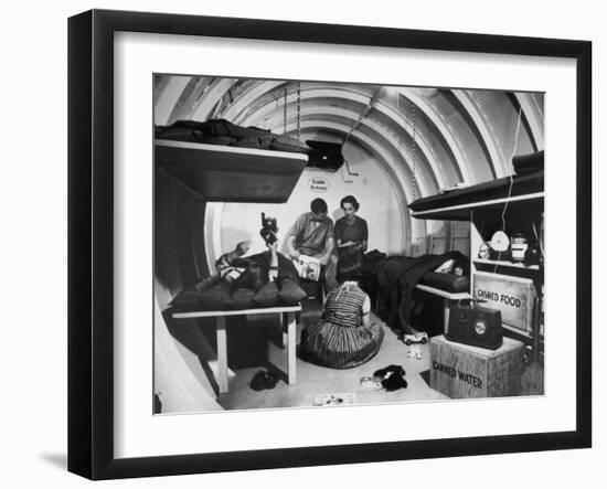 Interior View of Steel Underground Radiation Fallout Shelter Where Couple Relaxes with 3 Children-Walter Sanders-Framed Photographic Print