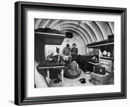 Interior View of Steel Underground Radiation Fallout Shelter Where Couple Relaxes with 3 Children-Walter Sanders-Framed Photographic Print