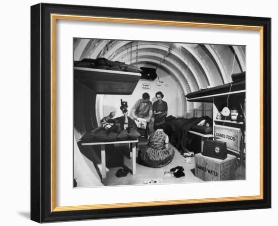 Interior View of Steel Underground Radiation Fallout Shelter Where Couple Relaxes with 3 Children-Walter Sanders-Framed Photographic Print