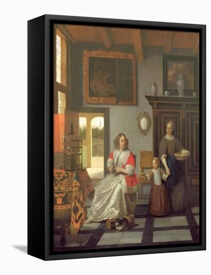 Interior with a Woman Knitting, a Serving Woman and a Child-Pieter de Hooch-Framed Premier Image Canvas
