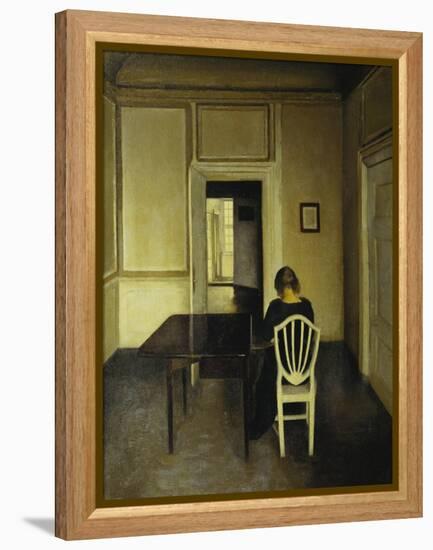 Interior with a Woman Seated on a White Chair-Vilhelm Hammershoi-Framed Premier Image Canvas