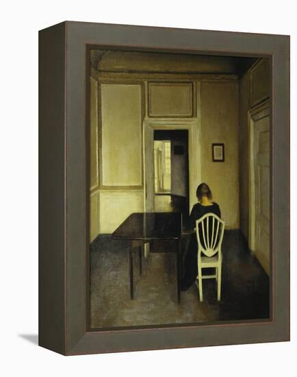 Interior with a Woman Seated on a White Chair-Vilhelm Hammershoi-Framed Premier Image Canvas