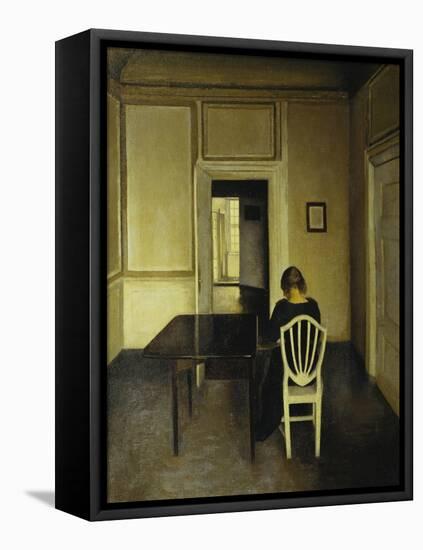 Interior with a Woman Seated on a White Chair-Vilhelm Hammershoi-Framed Premier Image Canvas