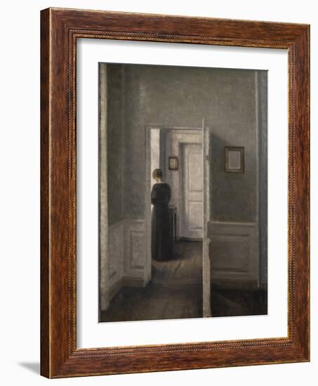 Interior with a woman standing-Vilhelm Hammershoi-Framed Giclee Print