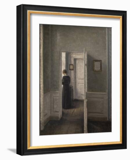 Interior with a woman standing-Vilhelm Hammershoi-Framed Giclee Print