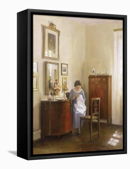 Interior with Lady Sewing, c.1910-Carl Holsoe-Framed Premier Image Canvas