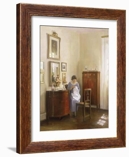 Interior with Lady Sewing, c.1910-Carl Holsoe-Framed Giclee Print