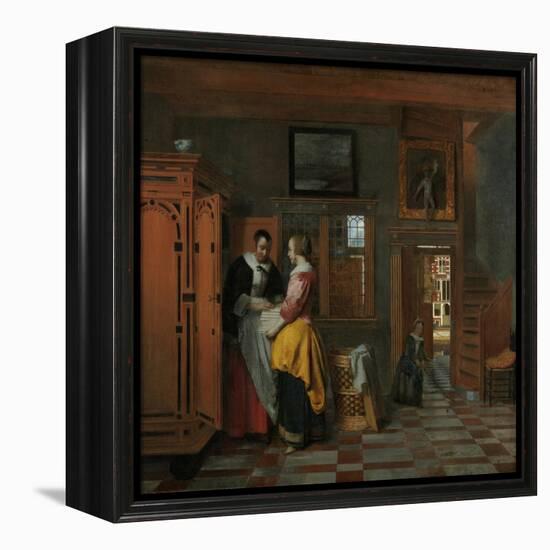 Interior with Women Beside a Linen Chest, 1663-Pieter de Hooch-Framed Premier Image Canvas