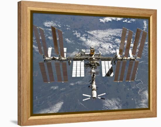 International Space Station Backgropped by a Blue and White Earth-Stocktrek Images-Framed Premier Image Canvas