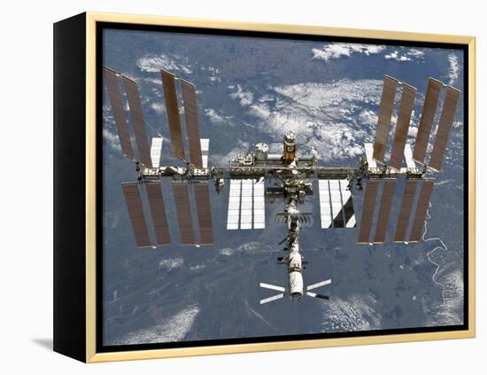 International Space Station Backgropped by a Blue and White Earth-Stocktrek Images-Framed Premier Image Canvas