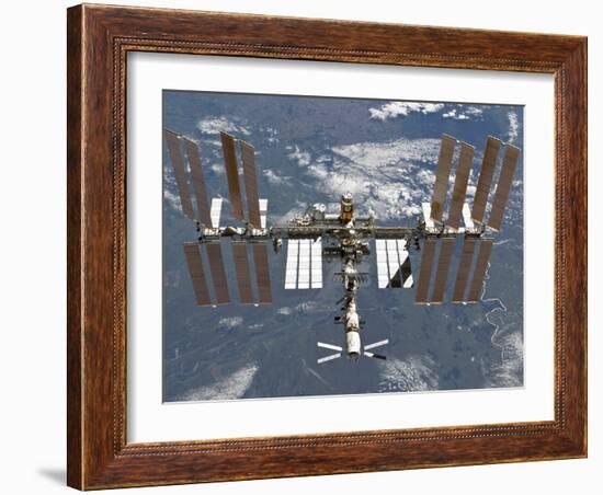 International Space Station Backgropped by a Blue and White Earth-Stocktrek Images-Framed Photographic Print