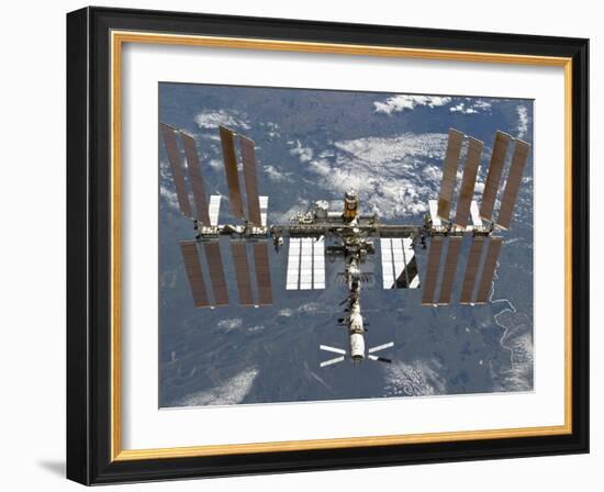 International Space Station Backgropped by a Blue and White Earth-Stocktrek Images-Framed Photographic Print