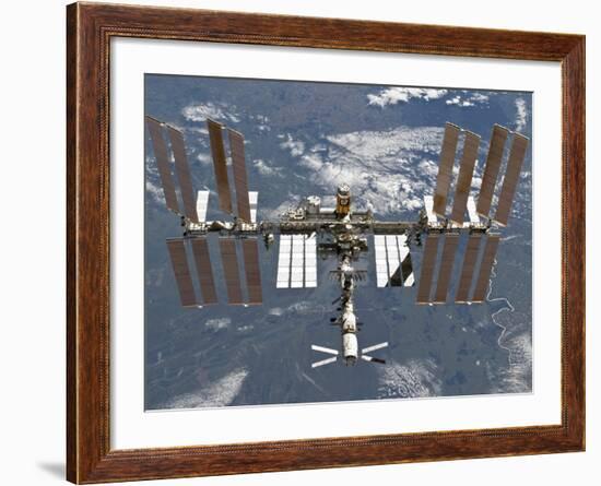 International Space Station Backgropped by a Blue and White Earth-Stocktrek Images-Framed Photographic Print