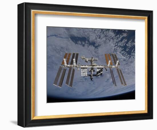 International Space Station Set Against the Background of a Cloud Covered Earth-null-Framed Photographic Print