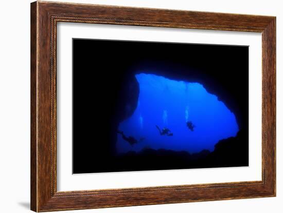 Into Darkness: Underwater Cave Scuba Diving Silhouettes-Rich Carey-Framed Photographic Print