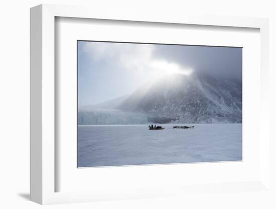 Inuit Hunter and His Dog Team Travelling on the Sea Ice, Greenland, Denmark, Polar Regions-Louise Murray-Framed Photographic Print