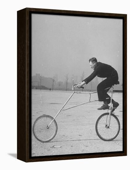 Inventor Maurice Steinlauf Riding Eccentric Bike with Roving Front Wheel-Wallace Kirkland-Framed Premier Image Canvas