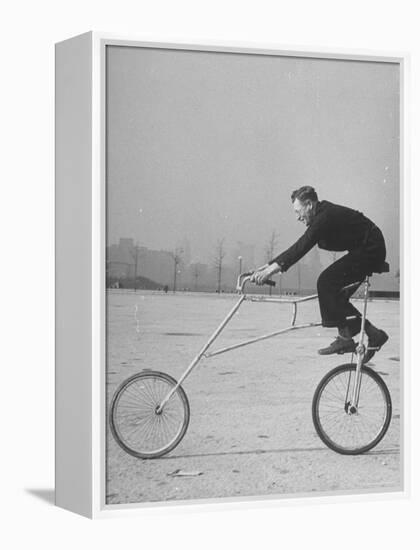 Inventor Maurice Steinlauf Riding Eccentric Bike with Roving Front Wheel-Wallace Kirkland-Framed Premier Image Canvas