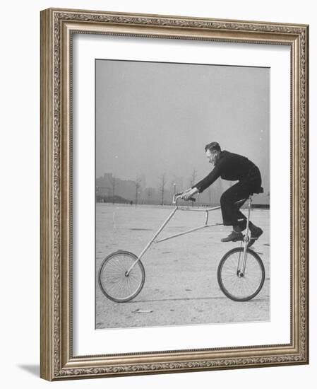 Inventor Maurice Steinlauf Riding Eccentric Bike with Roving Front Wheel-Wallace Kirkland-Framed Photographic Print