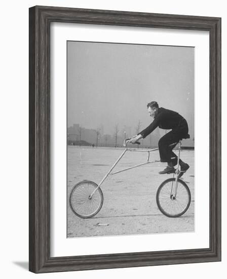 Inventor Maurice Steinlauf Riding Eccentric Bike with Roving Front Wheel-Wallace Kirkland-Framed Photographic Print