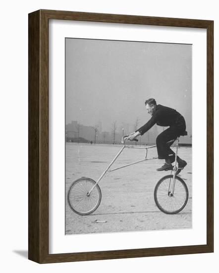 Inventor Maurice Steinlauf Riding Eccentric Bike with Roving Front Wheel-Wallace Kirkland-Framed Photographic Print