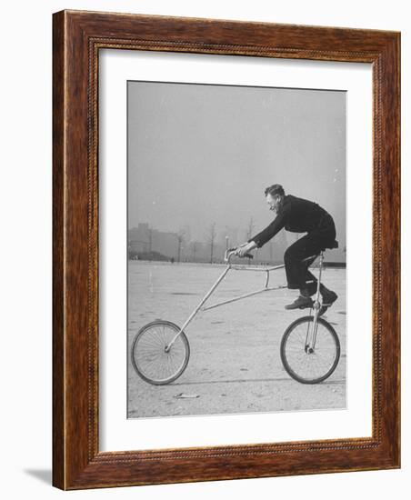 Inventor Maurice Steinlauf Riding Eccentric Bike with Roving Front Wheel-Wallace Kirkland-Framed Photographic Print