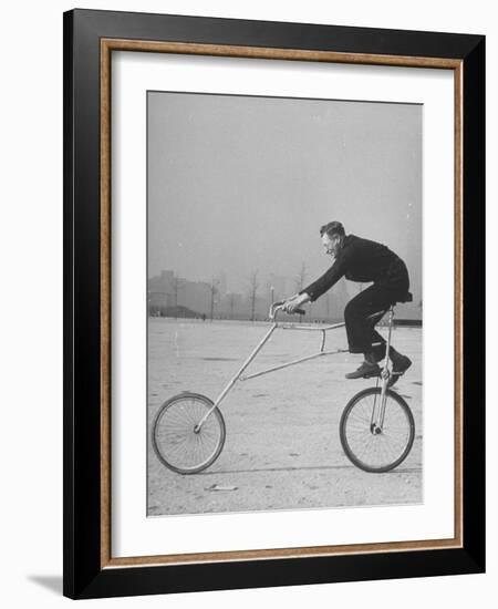 Inventor Maurice Steinlauf Riding Eccentric Bike with Roving Front Wheel-Wallace Kirkland-Framed Photographic Print