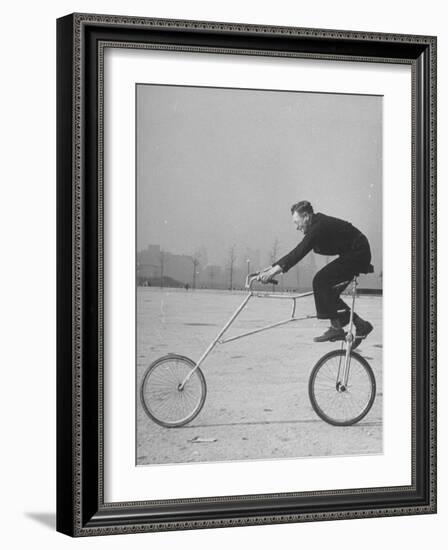 Inventor Maurice Steinlauf Riding Eccentric Bike with Roving Front Wheel-Wallace Kirkland-Framed Photographic Print