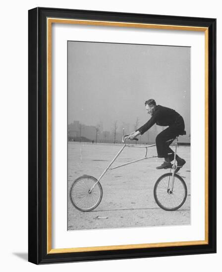 Inventor Maurice Steinlauf Riding Eccentric Bike with Roving Front Wheel-Wallace Kirkland-Framed Photographic Print