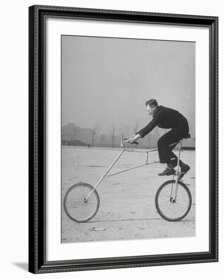 Inventor Maurice Steinlauf Riding Eccentric Bike with Roving Front Wheel-Wallace Kirkland-Framed Photographic Print