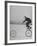 Inventor Maurice Steinlauf Riding Eccentric Bike with Roving Front Wheel-Wallace Kirkland-Framed Photographic Print