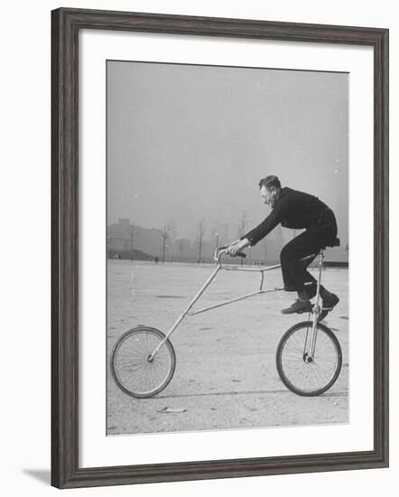 Inventor Maurice Steinlauf Riding Eccentric Bike with Roving Front Wheel-Wallace Kirkland-Framed Photographic Print