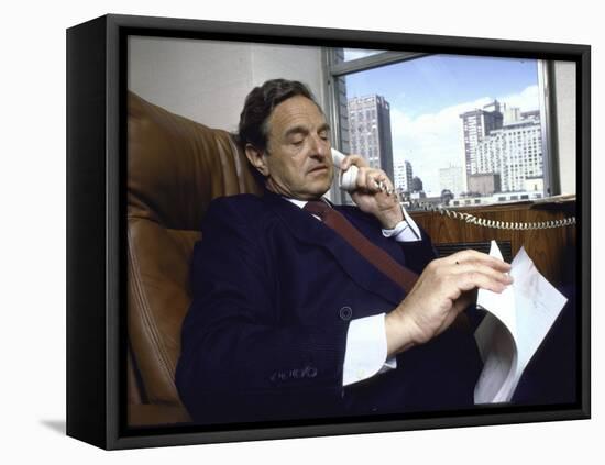 Investment Banker George Soros Working on Phone in Office-null-Framed Premier Image Canvas