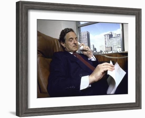 Investment Banker George Soros Working on Phone in Office-null-Framed Photographic Print