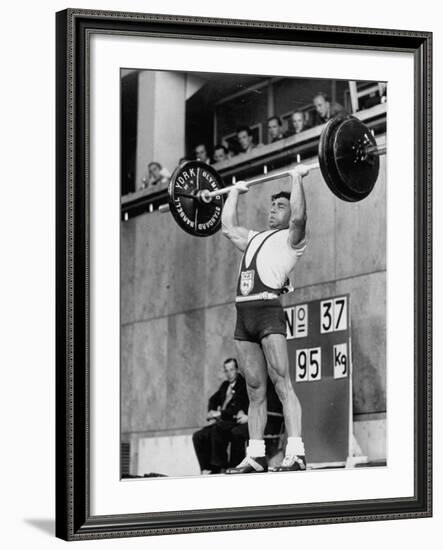 Iranian Weight Lifter M. Namdjou Struggling to Hold Up 206.5 Pound Weight at 1952 Olympics-null-Framed Premium Photographic Print