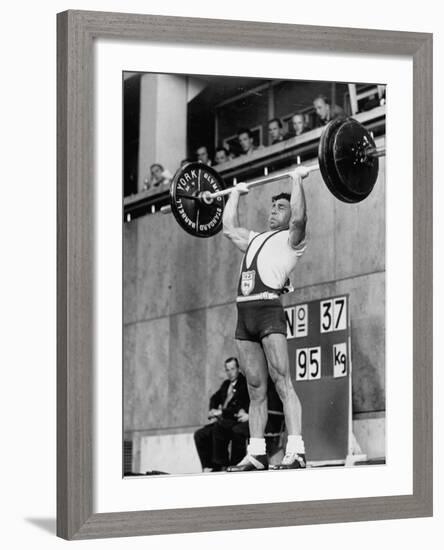 Iranian Weight Lifter M. Namdjou Struggling to Hold Up 206.5 Pound Weight at 1952 Olympics-null-Framed Premium Photographic Print