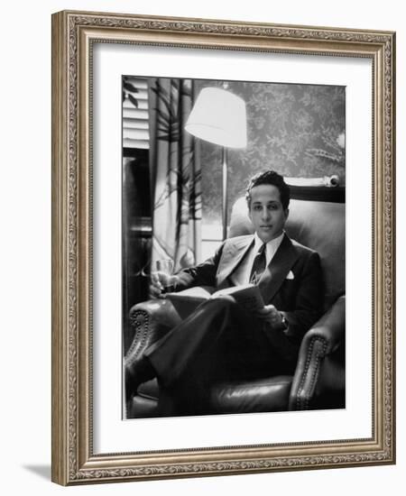 Iraq's King Feisal II Relaxing Reading a Book-Yale Joel-Framed Photographic Print