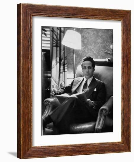 Iraq's King Feisal II Relaxing Reading a Book-Yale Joel-Framed Photographic Print