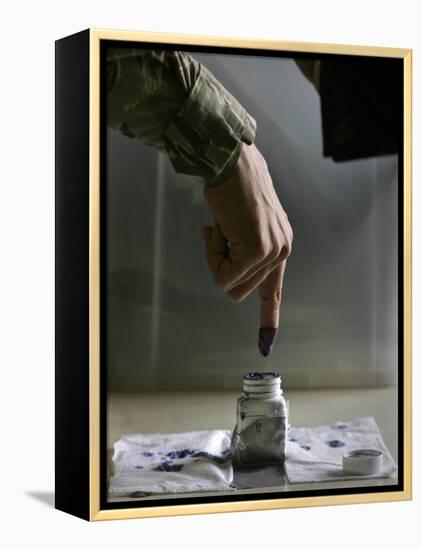 Iraqi Security Forces Member Inks His Finger after Casting His Vote at a Polling Center in Iraq-null-Framed Premier Image Canvas