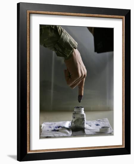 Iraqi Security Forces Member Inks His Finger after Casting His Vote at a Polling Center in Iraq-null-Framed Photographic Print