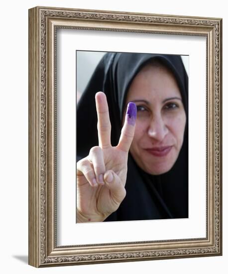 Iraqi Woman Holds Up Her Purple Finger, Indicating She Has Just Voted in Southern Iraq-null-Framed Photographic Print