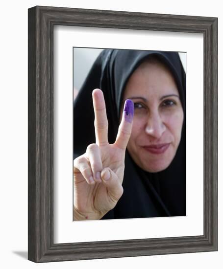 Iraqi Woman Holds Up Her Purple Finger, Indicating She Has Just Voted in Southern Iraq-null-Framed Photographic Print