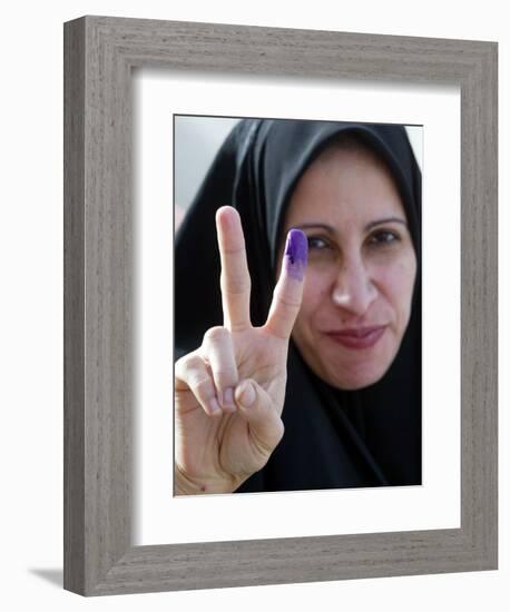 Iraqi Woman Holds Up Her Purple Finger, Indicating She Has Just Voted in Southern Iraq-null-Framed Photographic Print