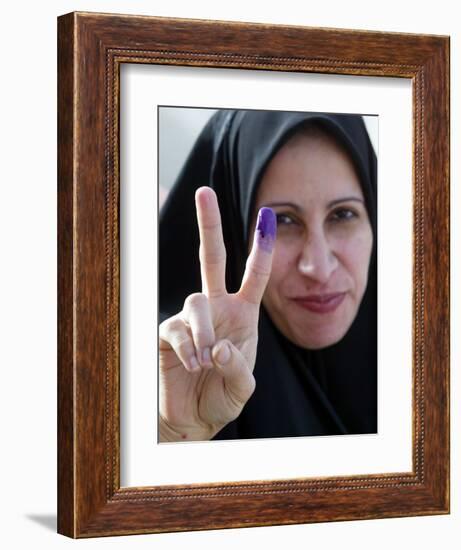 Iraqi Woman Holds Up Her Purple Finger, Indicating She Has Just Voted in Southern Iraq-null-Framed Photographic Print