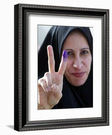 Iraqi Woman Holds Up Her Purple Finger, Indicating She Has Just Voted in Southern Iraq-null-Framed Photographic Print