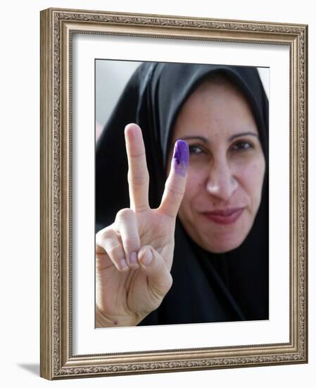 Iraqi Woman Holds Up Her Purple Finger, Indicating She Has Just Voted in Southern Iraq-null-Framed Photographic Print